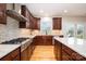 Kitchen boasts granite countertops and stainless steel appliances at 8127 Caliterra Dr, Charlotte, NC 28227