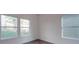 Bright bedroom with wood-look floors and large windows offering natural light at 558 Geneva Cir, Gastonia, NC 28056