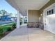 Covered front porch with stone base and white door at 558 Geneva Cir, Gastonia, NC 28056