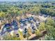 Aerial view of a neighborhood with various houses and trees at 558 Geneva Cir, Gastonia, NC 28056
