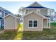 Two-story house with attached shed and small patio at 558 Geneva Cir, Gastonia, NC 28056