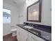 Bathroom with dark vanity and a shower/tub combo at 558 Geneva Cir, Gastonia, NC 28056