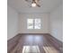 Bright bedroom featuring hardwood floors and large windows at 558 Geneva Cir, Gastonia, NC 28056