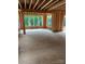 Interior framing of a new home under construction, showcasing a large window at 4293 Brandy Creek Ct # 91, Clover, SC 29710
