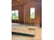 Interior framing of a new home under construction, showcasing large windows and open floor plan at 4293 Brandy Creek Ct # 91, Clover, SC 29710