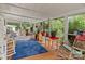 Spacious screened porch, perfect for outdoor relaxation at 7676 Shoupes Grove Church Rd, Hickory, NC 28612