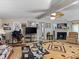 Cozy living room with fireplace, TV, and western-themed decor at 7676 Shoupes Grove Church Rd, Hickory, NC 28612