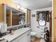 Clean bathroom with single sink vanity, toilet, and shower at 7676 Shoupes Grove Church Rd, Hickory, NC 28612