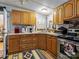 Well-equipped kitchen offering ample counter space and wood cabinetry at 7676 Shoupes Grove Church Rd, Hickory, NC 28612