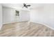 Bright bedroom with ceiling fan and vinyl plank flooring at 185 17Th Se St, Hickory, NC 28602