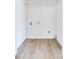 Laundry closet with wood floors and shelving at 185 17Th Se St, Hickory, NC 28602