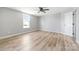 Bright bedroom with ceiling fan and vinyl plank flooring at 185 17Th Se St, Hickory, NC 28602