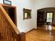 Bright entryway with hardwood floors and view of dining area at 1982 Hopewell Church Rd, Hiddenite, NC 28636