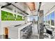 Upscale bar with marble countertop, modern stools, and city views at 215 N Pine St # 3705, Charlotte, NC 28202