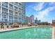 Inviting rooftop pool with comfortable lounge chairs at 215 N Pine St # 3705, Charlotte, NC 28202