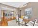 Elegant dining room, hardwood floors and view of kitchen at 215 N Pine St # 3705, Charlotte, NC 28202