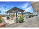 Outdoor grilling area with pergola and comfortable seating at 215 N Pine St # 3705, Charlotte, NC 28202
