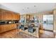 Modern kitchen with granite countertops and wood cabinets at 215 N Pine St # 3705, Charlotte, NC 28202