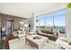Elegant living room with hardwood floors and city views at 215 N Pine St # 3705, Charlotte, NC 28202