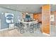 Contemporary bar with metallic accents and stylish seating at 215 N Pine St # 3705, Charlotte, NC 28202