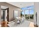 Modern dining room with hardwood floors and city views at 215 N Pine St # 3705, Charlotte, NC 28202