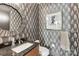 Stylish powder room with patterned wallpaper at 215 N Pine St # 3705, Charlotte, NC 28202