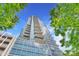Modern high rise building with glass facade and balconies at 215 N Pine St # 3705, Charlotte, NC 28202