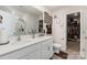 Double vanity bathroom with a large walk-in closet and shower at 9032 Remnick Dr, Gastonia, NC 28056