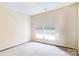 Well-lit bedroom with neutral walls and carpet flooring at 878 Treasure Ct, Fort Mill, SC 29708