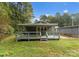 Rear view of house with covered deck at 217 Burrage Ne Rd, Concord, NC 28025