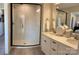 Elegant bathroom with a double vanity, a large shower, and modern finishes at 3018 Pirates Pl, Charlotte, NC 28216