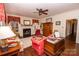 Spacious living room with hardwood floors, fireplace, and comfortable seating at 120 Bost St, Statesville, NC 28677