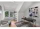 Home office with hardwood floors, window, and built-in shelving at 3109 Colyer Pl, Charlotte, NC 28205