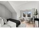 Bright bedroom with city view, comfy seating area, and stylish decor at 3109 Colyer Pl, Charlotte, NC 28205