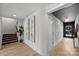 Bright entryway with hardwood floors and staircase leading upstairs at 3109 Colyer Pl, Charlotte, NC 28205