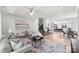 Spacious living room with a staircase and large art piece at 3109 Colyer Pl, Charlotte, NC 28205