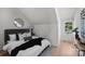 Spacious bedroom with large window and light hardwood floors at 3109 Colyer Pl, Charlotte, NC 28205