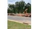 Residential lot under construction with heavy machinery present at 3014 Pirates Pl, Charlotte, NC 28216