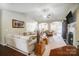 Spacious living room with hardwood floors and a neutral color scheme at 8928 Carneros Creek Rd, Charlotte, NC 28214