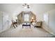 Bonus room with vaulted ceiling, a couch, and carpet flooring at 8928 Carneros Creek Rd, Charlotte, NC 28214
