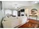 Spacious living room with hardwood floors and a fireplace at 8928 Carneros Creek Rd, Charlotte, NC 28214