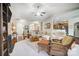 Spacious living room with vaulted ceiling, large sectional sofa and hardwood floors at 8928 Carneros Creek Rd, Charlotte, NC 28214