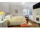 Light and airy bedroom with hardwood floors at 8928 Carneros Creek Rd, Charlotte, NC 28214