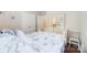 Bedroom with floral bedding and a dresser at 8928 Carneros Creek Rd, Charlotte, NC 28214