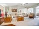 Open living room with vaulted ceiling, sectional sofa and hardwood floors at 8928 Carneros Creek Rd, Charlotte, NC 28214
