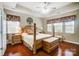 Spacious bedroom with hardwood floors and a four-poster bed at 8928 Carneros Creek Rd, Charlotte, NC 28214