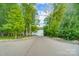 Private paved road leading to lake access at 8928 Carneros Creek Rd, Charlotte, NC 28214