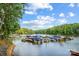 Community boat dock with several boats at 8928 Carneros Creek Rd, Charlotte, NC 28214