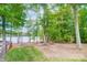 Relaxing lakeside picnic area with tables and grills, perfect for outdoor entertaining at 8928 Carneros Creek Rd, Charlotte, NC 28214