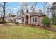 Two-story home with neutral exterior and landscaping at 9101 New Oak Ln, Huntersville, NC 28078